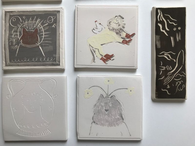 Tiles with underglaze painting and sgraffito
