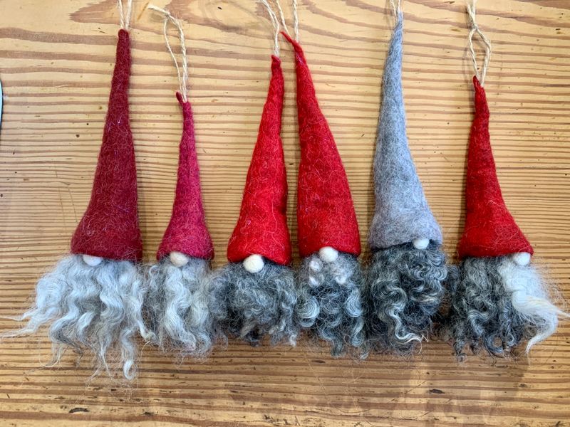 6 Scandi Tomte - Ghomes with various heights of hat and shades of red and grey.  Beards are light to dark grey