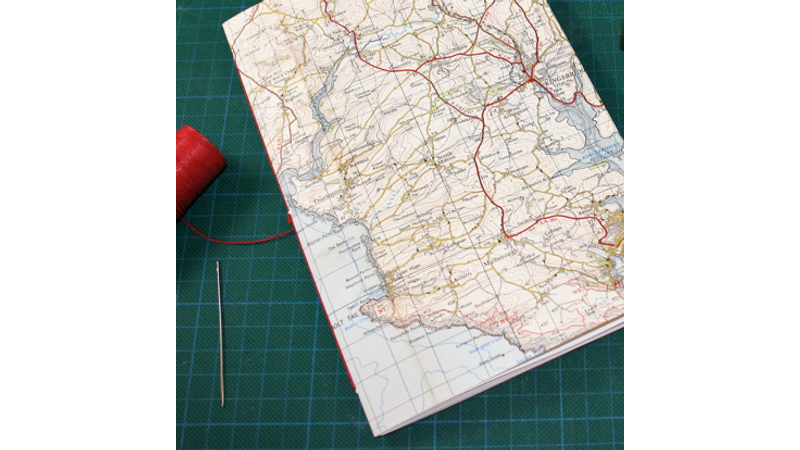 Bound booklet with map cover
