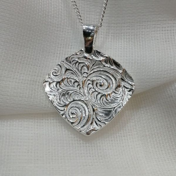 Fine silver textured pendant made on a taster session