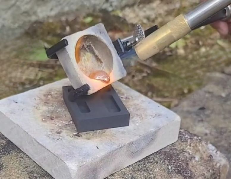 Melting gold to create an ingot