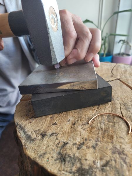 Shaping a recycled piece of metal