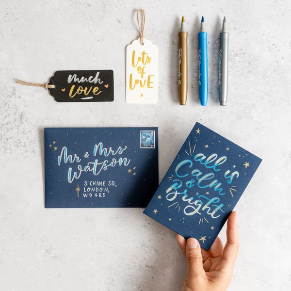 Brush lettered Calm and Bright card and envelope project