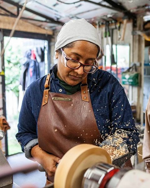 Masuma at the lathe