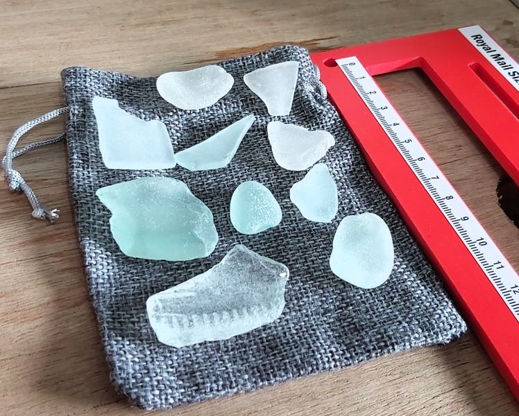RULER NEXT TO THE SEA GLASS TO GIVE YOU AN IDEA OF THE SIZES OF ECO SEA GLASS