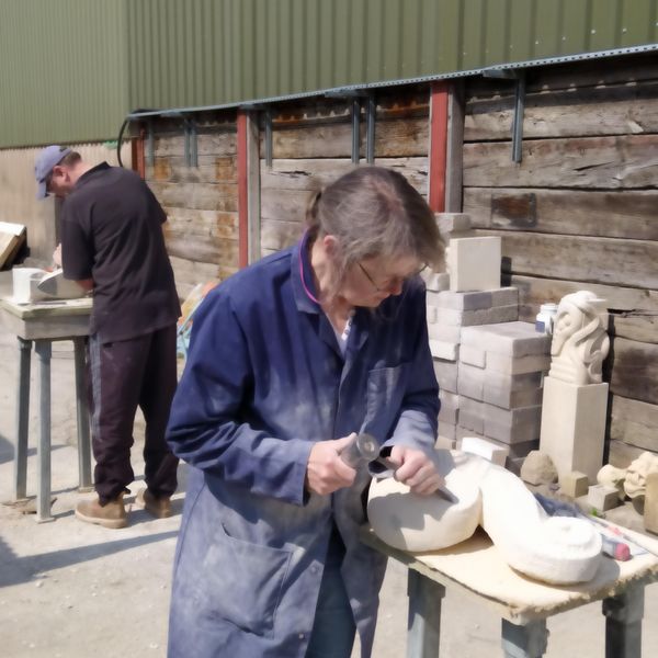 On a nice day it is good to work outside at The Stone Carving Studio