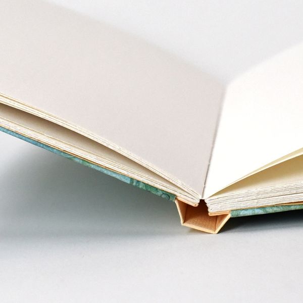  Sewn Boards Binding - a lay flat book with a breakaway spine