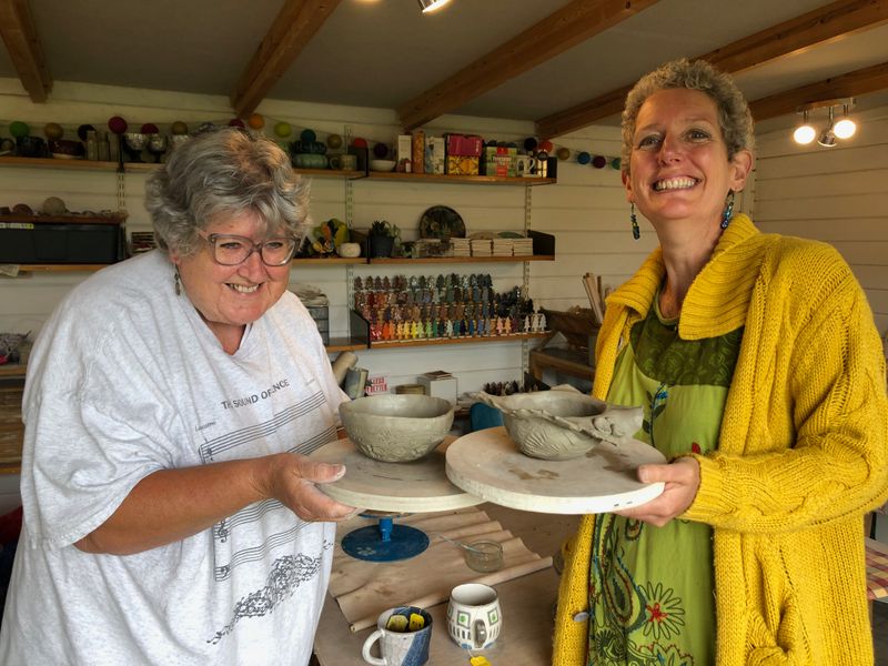 A very happy mum and daughter sharing the joy of making fabulous pots together.