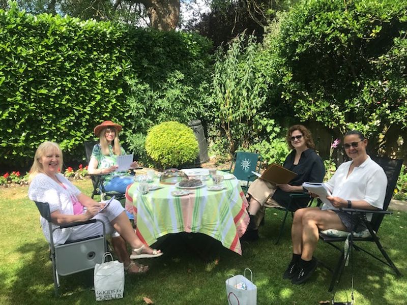 Group class, writing in the garden. 