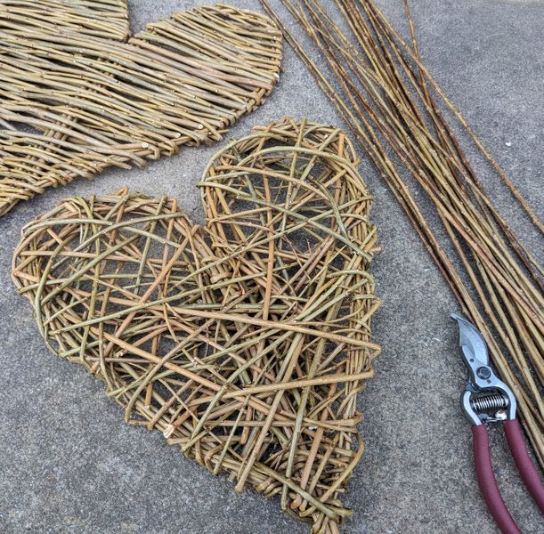 Willow heart with rods and secateurs
