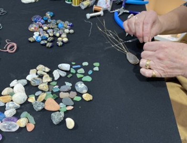A huge array of glass cabochons, stones and sea glass to choose to work with.