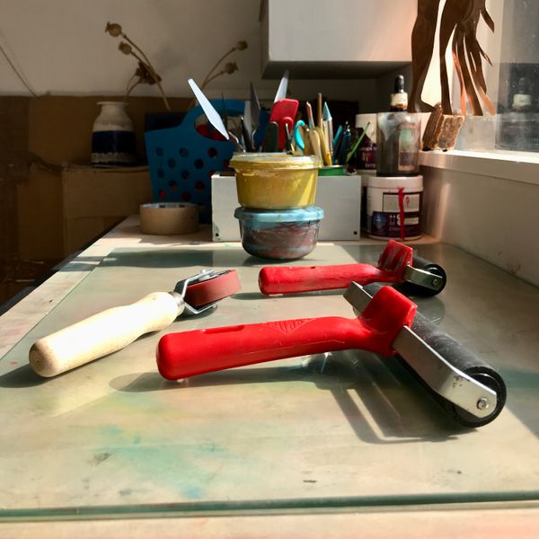 Printmaking tools and inking area