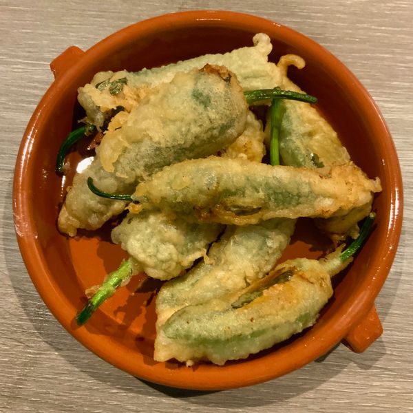 Padron peppers stuffed with Manchego cheese and deepp fried in batter