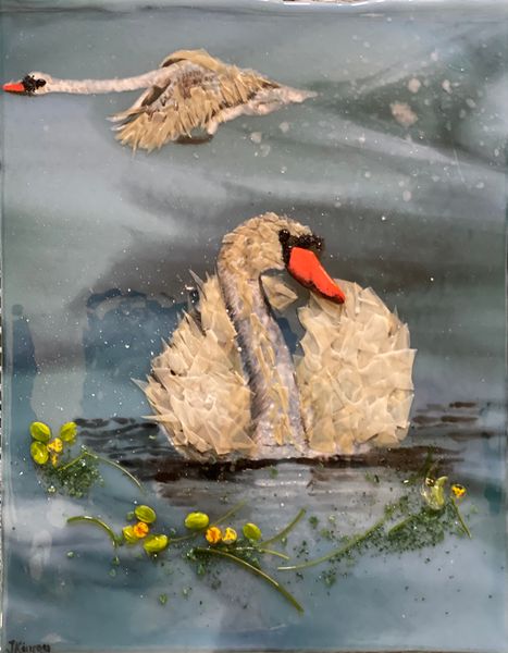 Swans painted in enamels with glass furnishings