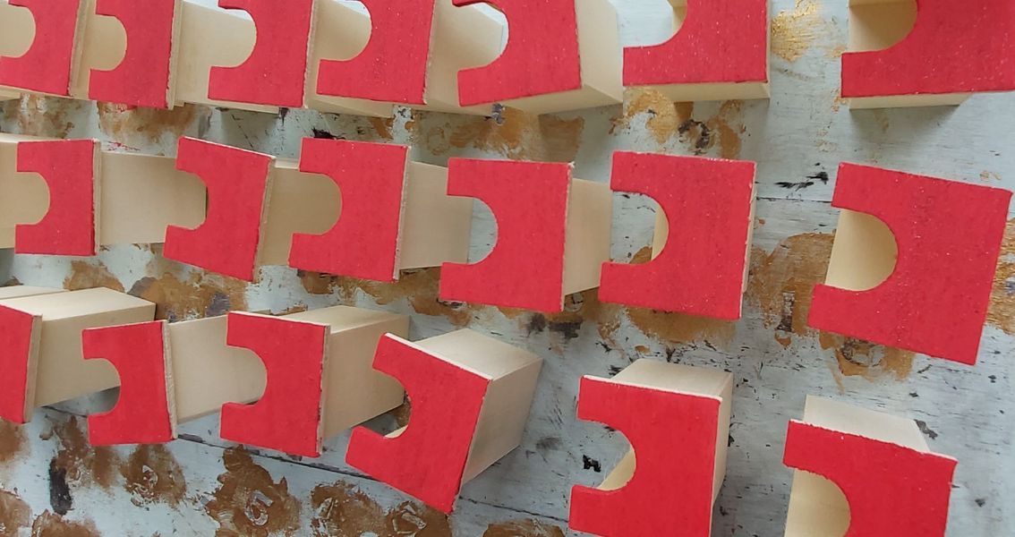 Image of the Red Drawers just painted waiting for them to dry in the Craft Studio