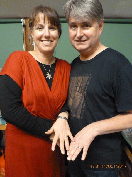 Phil and Julie, the happy couple showing their rings