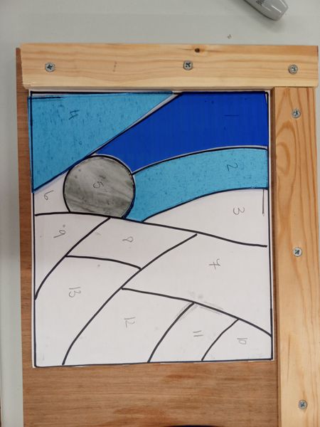 Starting to cut stained glass.