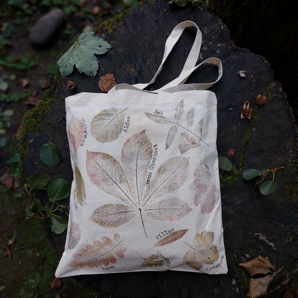 Leaf printed tote bag, with tree names printed next to each leaf.