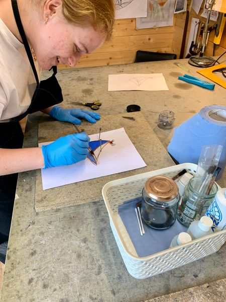 Applying flux to the copper foil ready for soldering