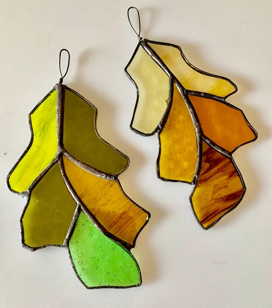 Two finished oak leaves