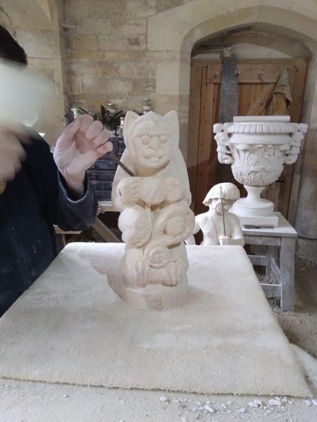 A Hunkupunk being carved