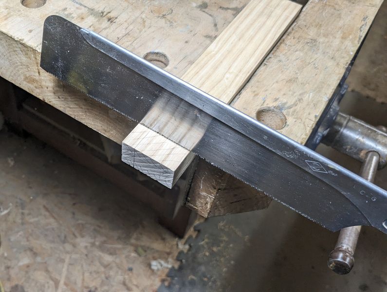 Cutting the shoulder of the tenon joint with a Japanese tenon saw