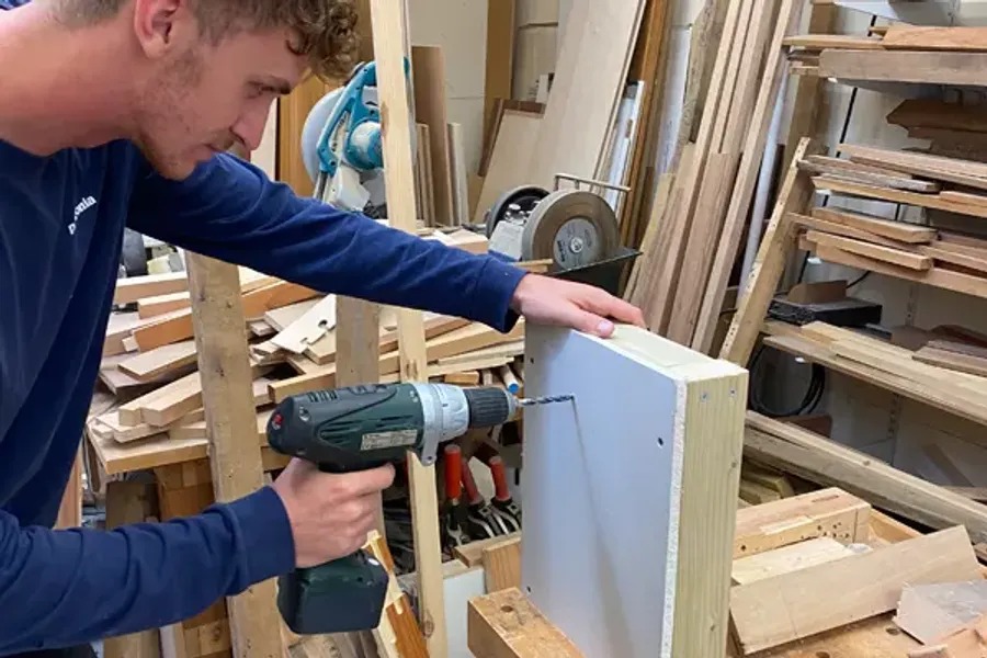 Fixing a shelf, Great British Woodshop, West Byfleet, Surrey