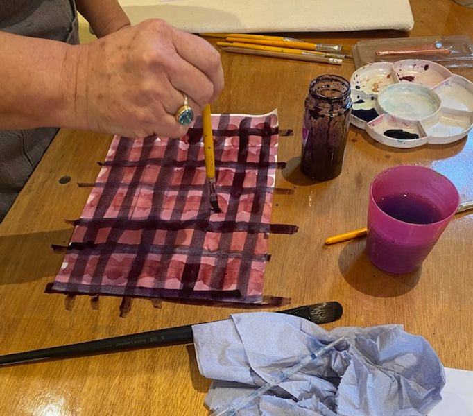 the dyes are first painted onto paper flat or as a pattern