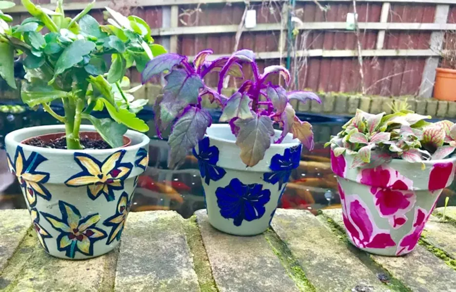 Decoupaged planters