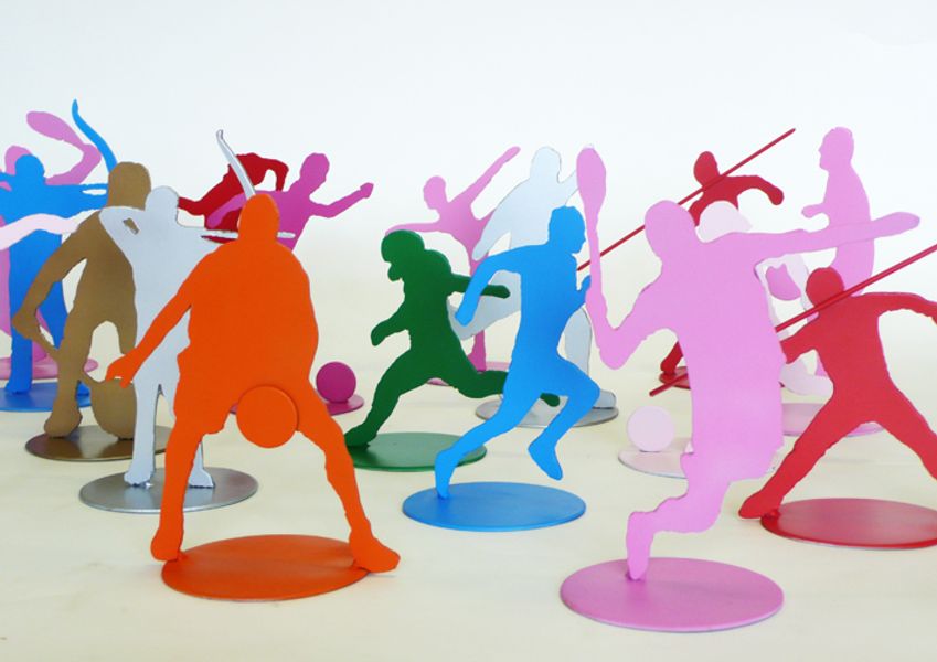 Sports figures cut from steel and painted by Philip's students