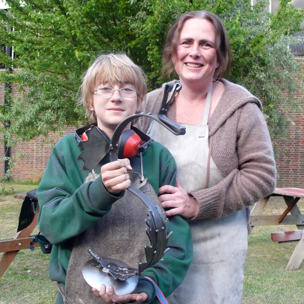 Mum and son with their Seahorse sculpture