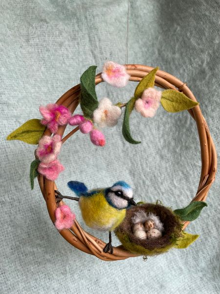 a finshed 'Blue Tit and Blossom Hoop' from the workshop